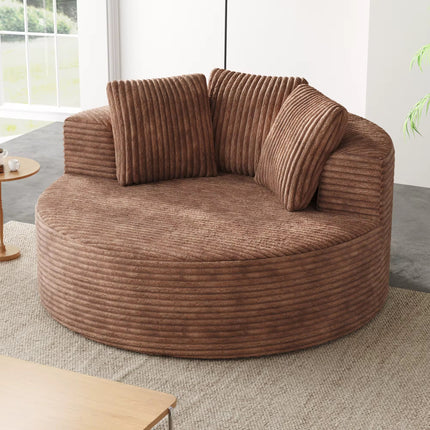 Round, single-seater sofa chair made of vacuum-compressed foam