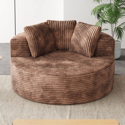 Round, single-seater sofa chair made of vacuum-compressed foam