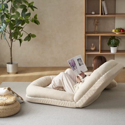 Small, compact reclining sofa for the living room, a practical lazy nook with a tatami mat